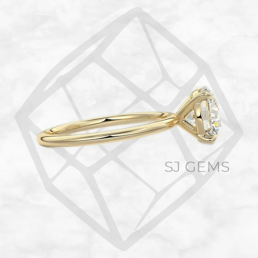 classic solitaire | round with 9k yellow gold metal and  shape diamond