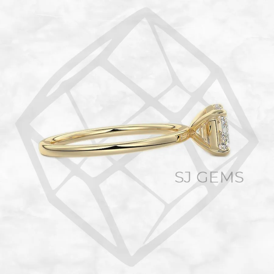 east west | emerald with 9k yellow gold metal and  shape diamond