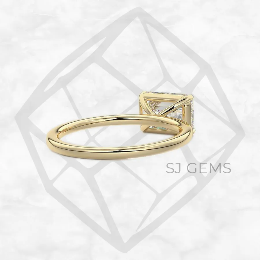 east west | emerald with 9k yellow gold metal and  shape diamond