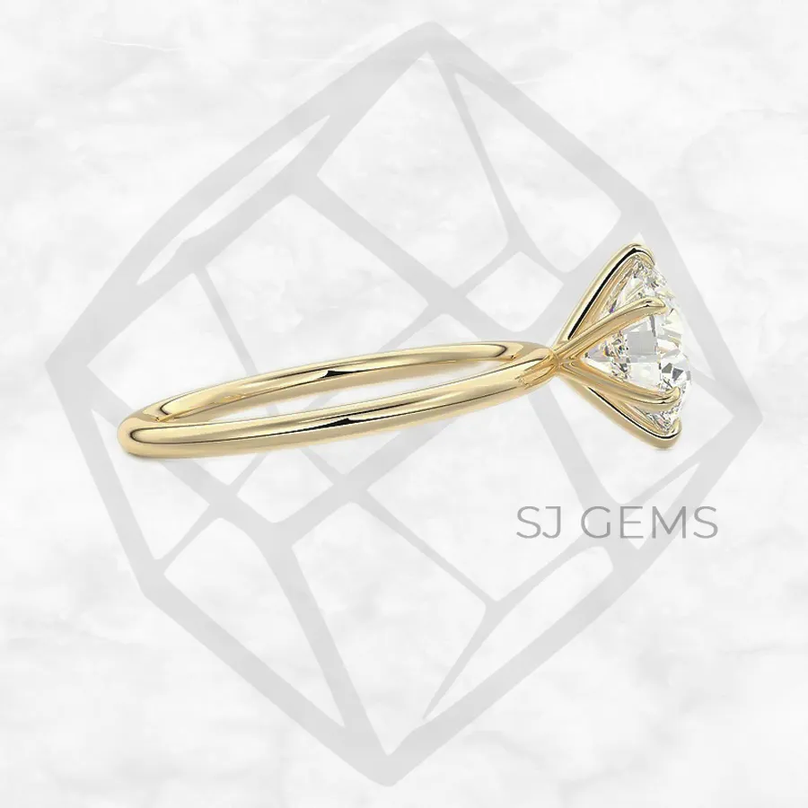 six prong solitaire | round with 9k yellow gold metal and  shape diamond