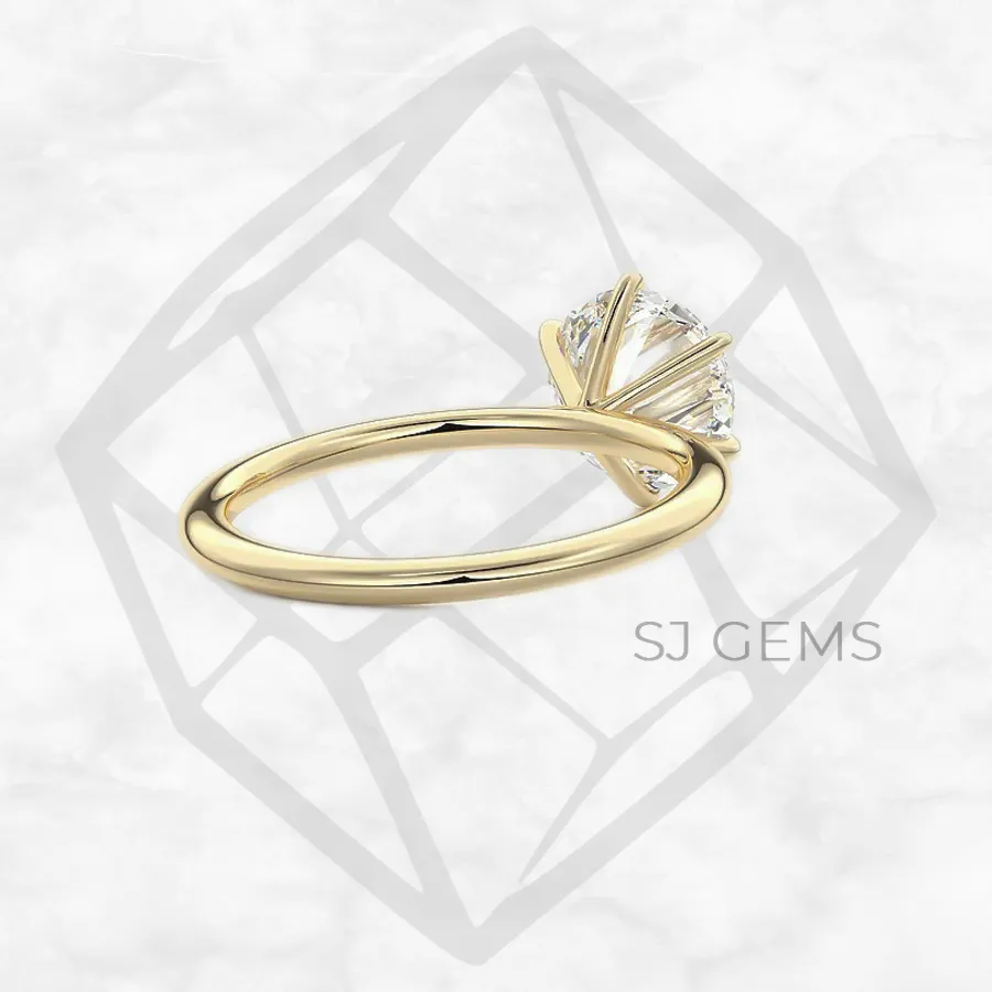 six prong solitaire | round with 9k yellow gold metal and  shape diamond