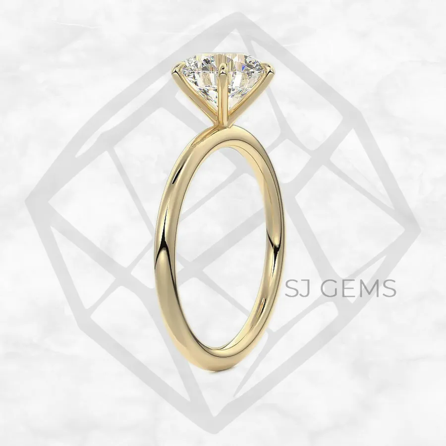 six prong solitaire | round with 9k yellow gold metal and  shape diamond