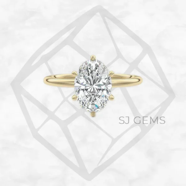 six prong solitaire | oval with 9k yellow gold metal and  shape diamond