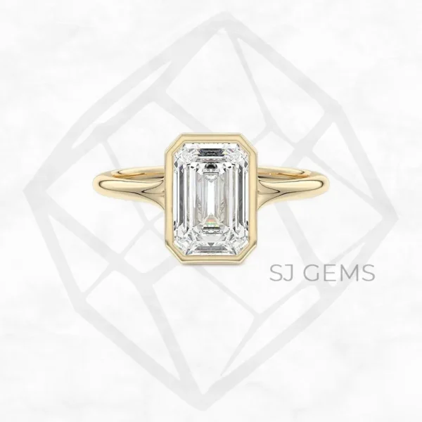 blowy bezel | emerald with 9k yellow gold metal and  shape diamond