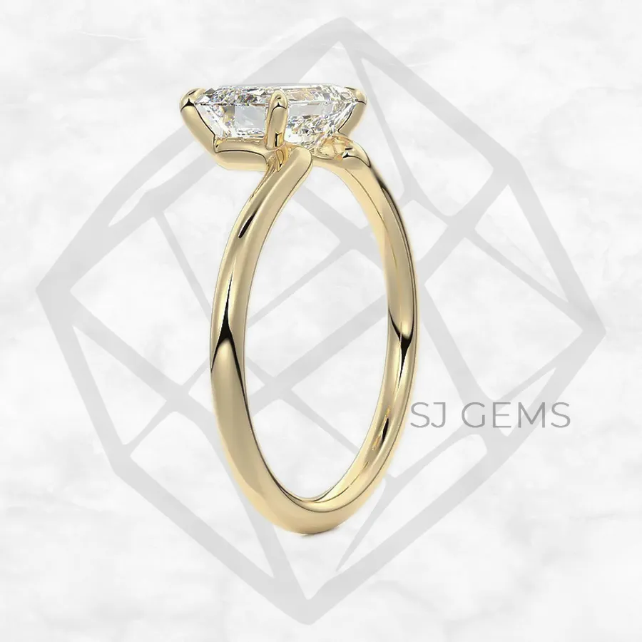 the stray | emerald with 9k yellow gold metal and  shape diamond
