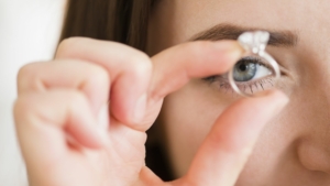 looking closely at an engagement ring
